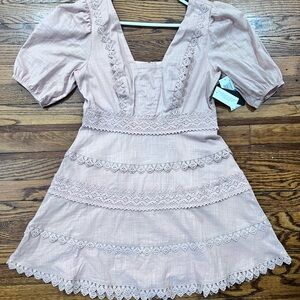 City Studio’s Juniors Fit and Flare Puff Sleeves Eyelet Pink Dress